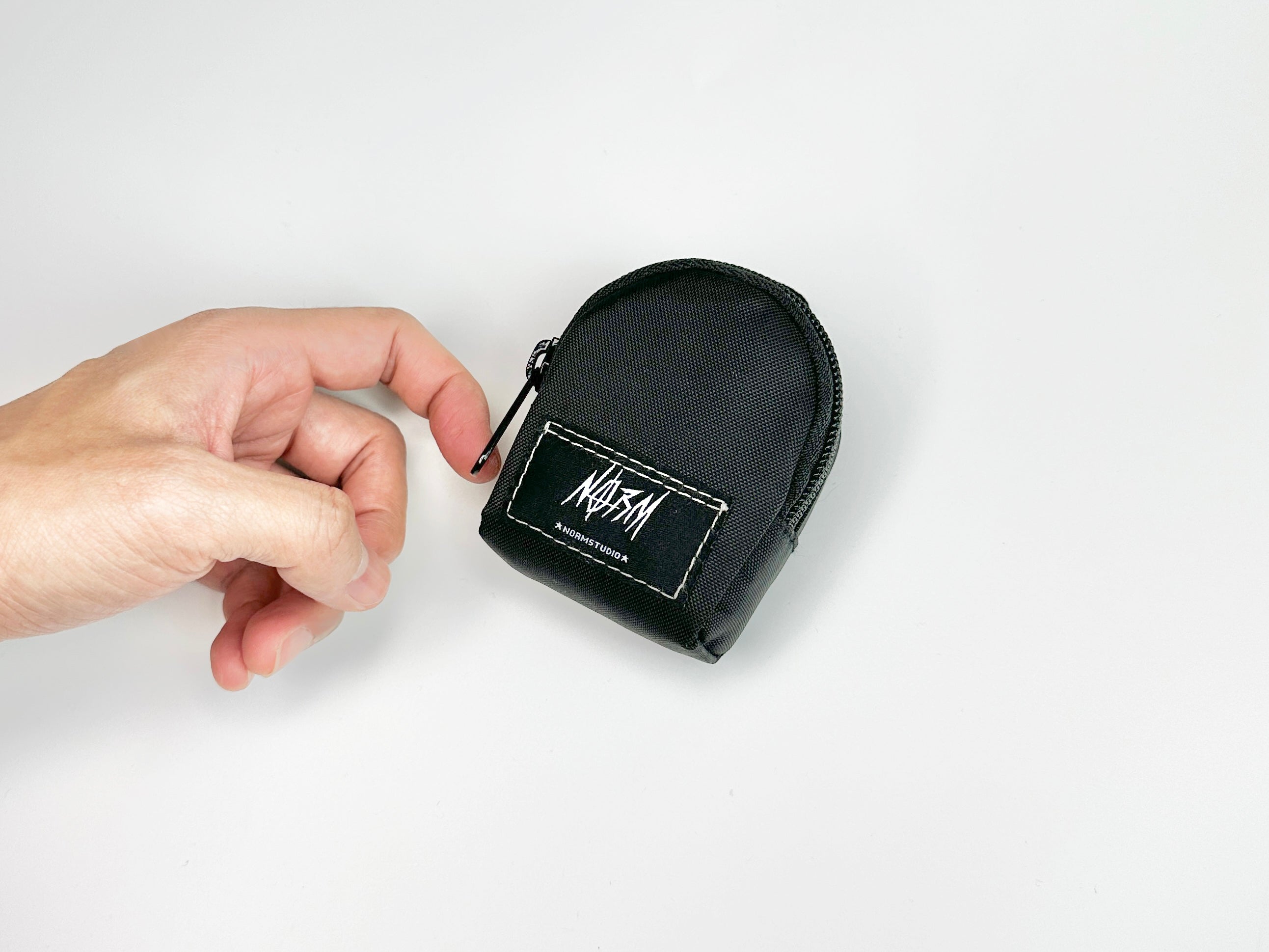 NORM "EM" WRIST BAG